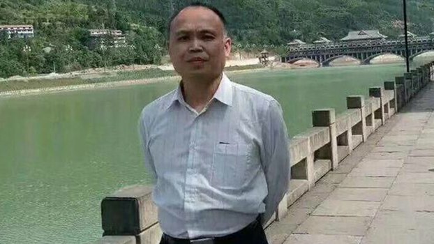 China Jails Rights Lawyer Yu Wensheng For Four Years in Secret Trial